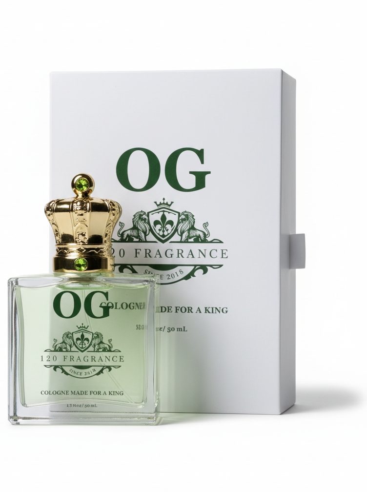 A bottle of OG fragrance, featuring a gold crown cap, displayed next to its green and white packaging box.
